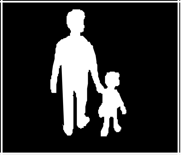 The black silhouette of a man walking with his child on an urban street at nighttime.