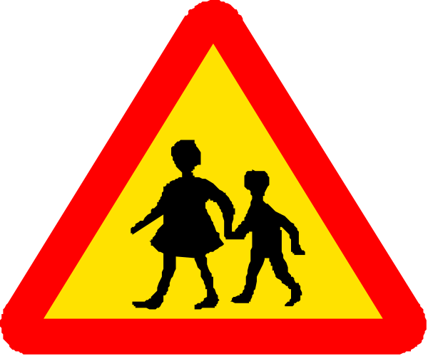 The image shows a red triangular traffic sign with white borders featuring two children walking together on it; below this is another smaller rectangular yellow road safety sign indicating pedestrians crossing ahead.