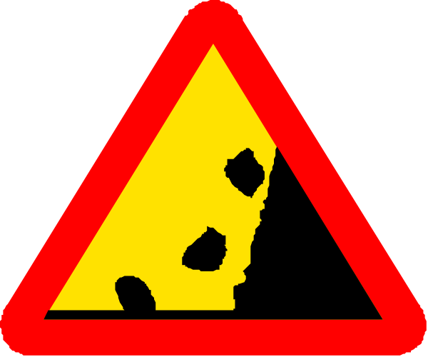 The image shows a red triangular warning sign with an exclamation mark inside it on top of another similar triangle that has been partially obscured by what appears to be debris or rubble at its center.