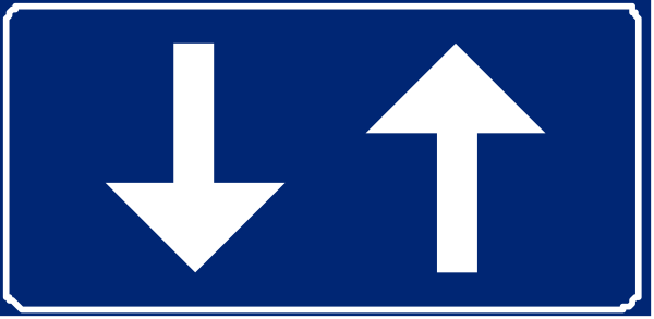 The image shows a blue sign with white arrows pointing upwards to indicate an upward directional change on a roadway.