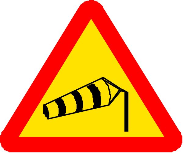 The image shows a triangular traffic sign with an exclamation mark inside it on top of another triangle that has two arrows pointing in opposite directions; below these signs is a smaller square warning about construction work, featuring symbols for explosives and heavy machinery.
