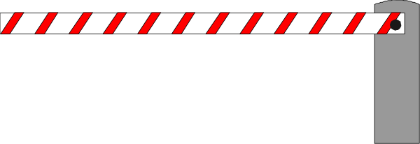 The image shows a red and white striped barricade tape on what appears to be an object with black edges that is partially visible in front of it.
