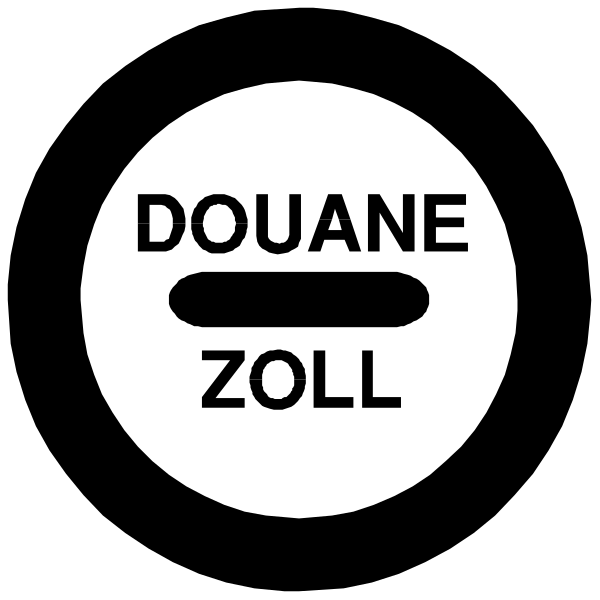 The image shows a black circle with white text that reads "DOUANE ZOLL" on it against an indistinct background.