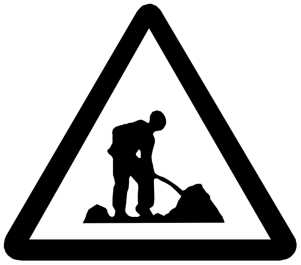 The black and white silhouette of a construction worker shoveling dirt with an excavator nearby on what appears to be a building site background.