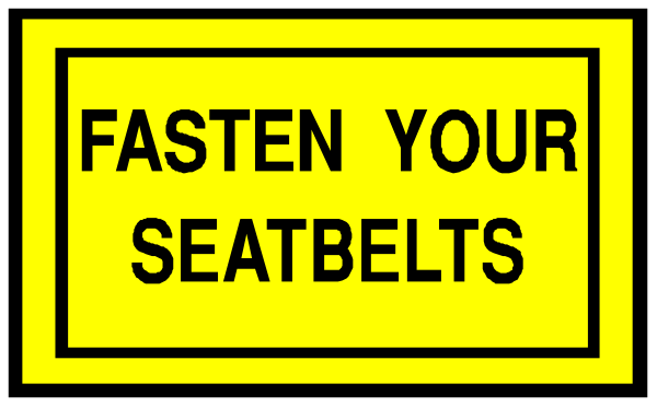 The image shows a yellow sign with black text that reads "FASTEN YOUR SEATBELTS" on top of another smaller white rectangular sign below it which says "FAMILY RIDE".