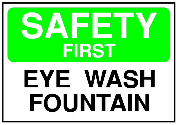 The image shows a sign with text that reads "SAFETY FIRST EYE WASH FOUNTAIN."