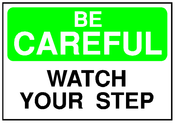 The image shows a sign with text that reads "BE CAREFUL" at top followed by an instruction to watch your step below it.