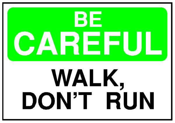 The image shows a sign with text that reads "BE CAREFUL DON'T RUN" on top of another smaller green rectangular sign below it which says "WALK".