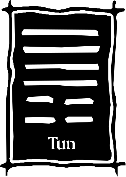 The image shows a black and white photo of an object with text that reads "tun."