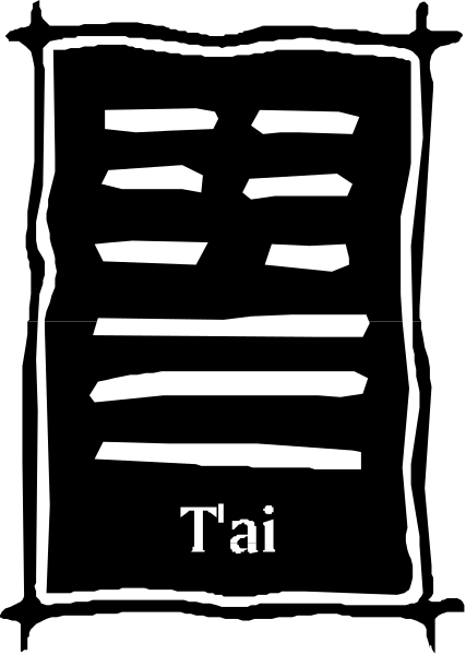 The black and white photo shows a Tai Chi symbol with Chinese characters on it against a dark background.