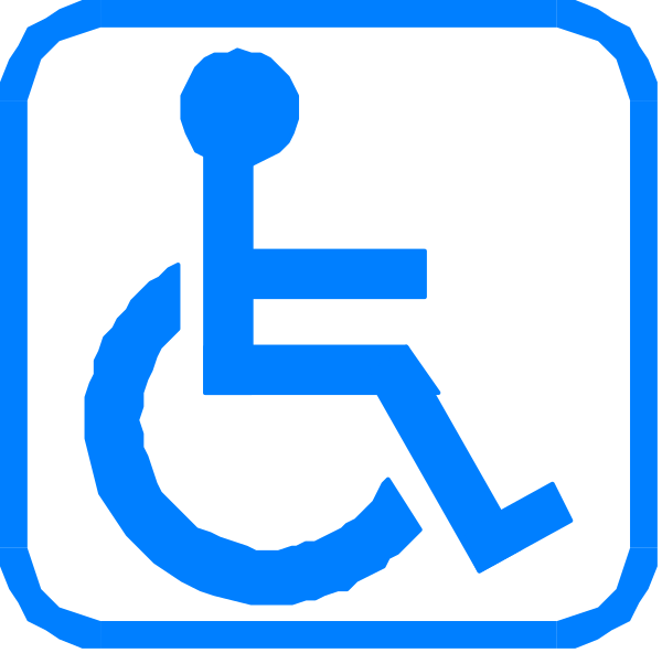 The image shows a blue handicap sign with an icon of a wheelchair on it next to another smaller white arrow pointing left towards what appears to be stairs indicating accessibility for disabled individuals in that area.
