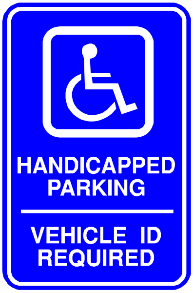The sign indicates a handicapped parking space with an accompanying blue vehicle symbol above it on top of another smaller white rectangle that says "vehicle id required."