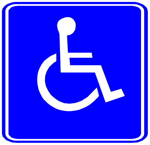 The image shows a blue handicap sign with white text indicating that it is for wheelchair users only on top of another smaller identical sign below it to its right side.