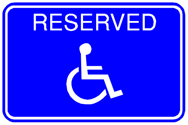 The image shows a blue parking sign with white text that reads "RESERVED" above an icon of a wheelchair indicating accessible space for disabled individuals.