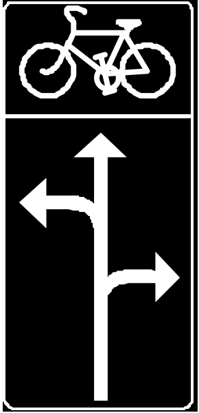 The image shows a black and white sign with an arrow pointing to three different directions: left for bicycles, straight ahead indicating no turn allowed, right towards another direction without any indication of what it leads to.