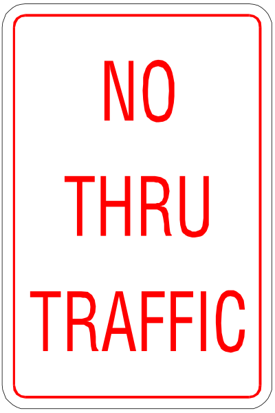 The sign says "no through thru traffic". It's a warning for drivers to be cautious about entering an area where there is no exit route ahead of them.