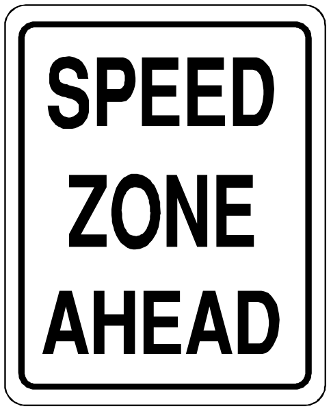 The image shows a black and white speed limit sign with text that reads "SPEED ZONE BEHEAD."