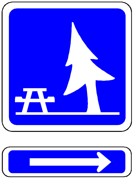 The picture shows a blue sign with white text featuring an icon of trees on it next to two arrows pointing left and right indicating directions towards camping areas; there is also a small image within this larger one depicting a campsite scene, including tents, chairs, picnic tables, pine tree silhouettes in the background.