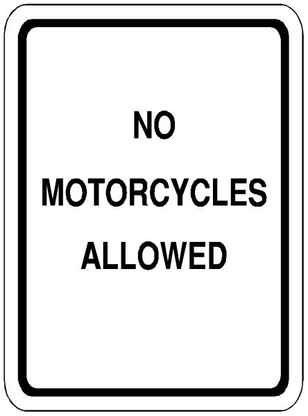 The sign says "no motorcycles allowed." It's a black and white photo of an informational traffic sign with text on it indicating restrictions for certain vehicles in that area.