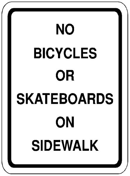 The sign says "no bicycles or skateboards on sidewalks."