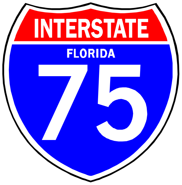 The image shows two highway signs: a blue Interstate 75 sign with white text that reads "INTERSTATE FLORIDA" on top of another similar-looking but smaller black and white interstate sign below it, both set against different backgrounds. There is no additional context provided about the setting or objects in this image beyond what has been described above. The focus appears to be solely on these two signs with their respective texts and colors.