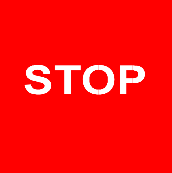The image shows a red stop sign with white text that reads "STOP."