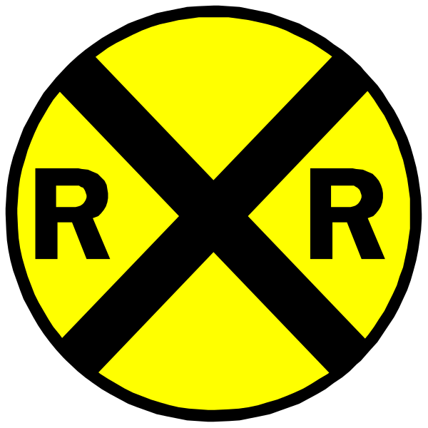 The image shows a yellow circular sign with an "X" inside it on top of which is superimposed text that reads "RJRT."