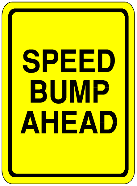 The sign says "speed bump ahead". It's a warning for drivers to slow down as there is speed bumps on this roadway section.