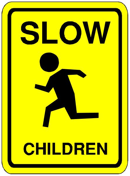 The sign says "SLOW CHILDREN" with a silhouette of someone running on it.