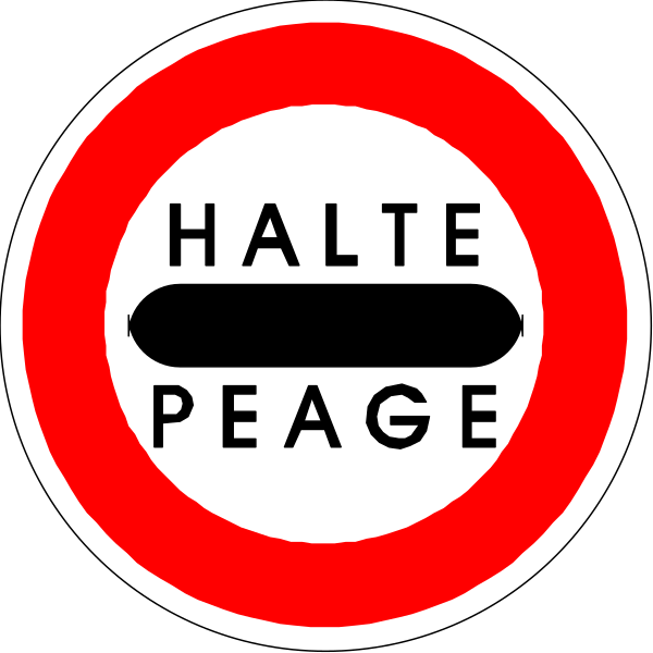 The image shows a red circular sign with white text that reads "HALTE PEAGE" on it, indicating a toll booth ahead in French.