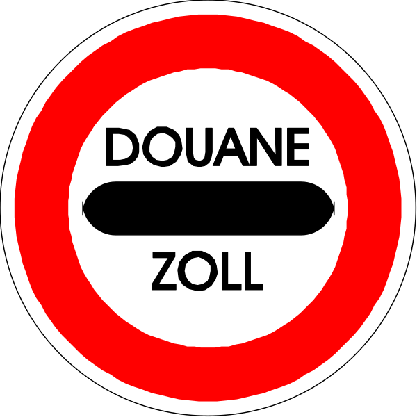 The image shows a red circular sign with white text that reads "Douane Zoll," indicating it is related to customs in German-speaking regions of Europe where this symbol might be found on roads leading into countries from other European Union nations, warning drivers about border controls and possible delays at the frontier.
