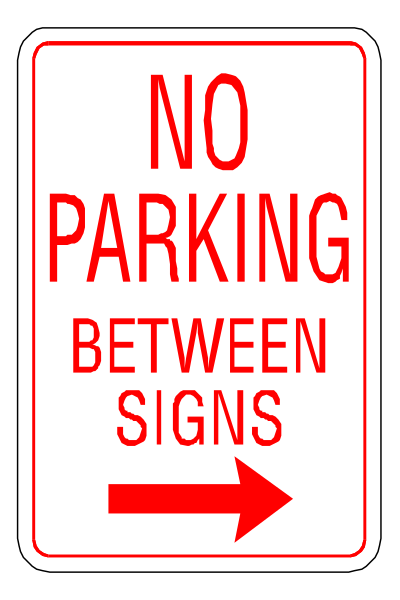 The sign says "no parking between signs." It's a black and white photo of an informational street sign with red lettering indicating no parking in that area from 9 am to 6 pm on weekdays, except for loading zones. There is also another smaller text underneath the main message stating there are two exceptions: delivery vehicles can park at any time between signs A & B; and emergency vehicle drivers may stop or stand their vehicle within this zone if necessary during an actual emergency situation only after obtaining permission from a police officer on duty in that area, except for loading zones.