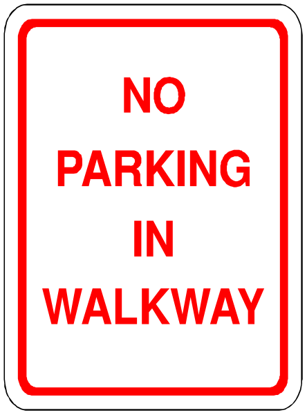 The image shows a no parking sign with red lettering on it placed next to a sidewalk at an intersection of two streets in what appears to be a residential area during daylight hours.