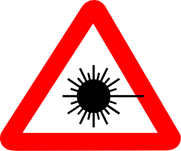 The image shows a trio of red warning signs with white borders featuring black symbols: two have an exclamation mark inside them indicating danger ahead; one has a silhouette of what appears to be a nuclear explosion, suggesting radiation hazard.