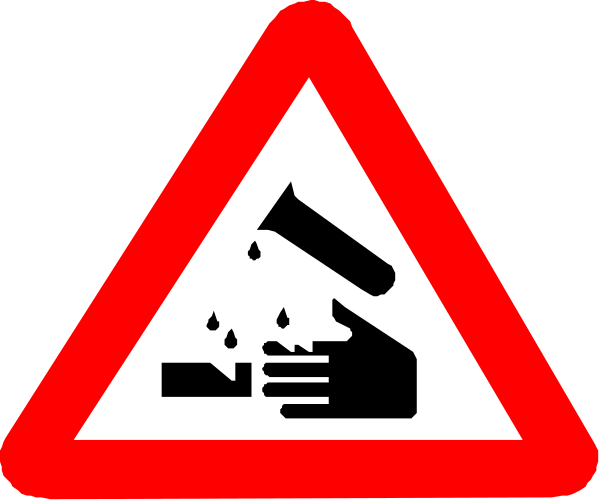 The image shows a red triangle sign with an illustration of water droplets falling from above onto hands that appear to be washing dishes below it; in front is another smaller triangular warning sign depicting two people shaking their heads, and next to them there's a black silhouette figure pouring liquid into the same hand.