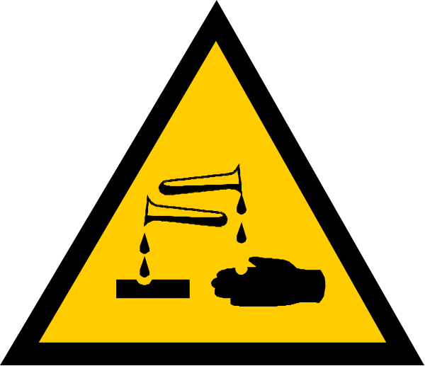 The image shows a yellow hazard sign with black text that includes an exclamation mark inside of it, indicating caution; below this symbol is another warning triangle containing two crossed-out figures resembling people lying on their backs and what appears to be a small explosion or fireball at the bottom.