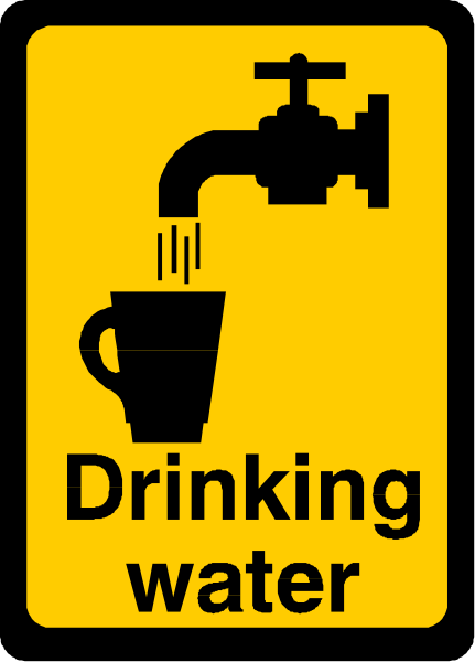The image shows a yellow sign with black text that reads "DRINKING WATER" at its top right corner; below this is an illustration of water pouring from a fire hydrant into two cups, one labeled 'coffee' and another not labeled but presumably for drinking.