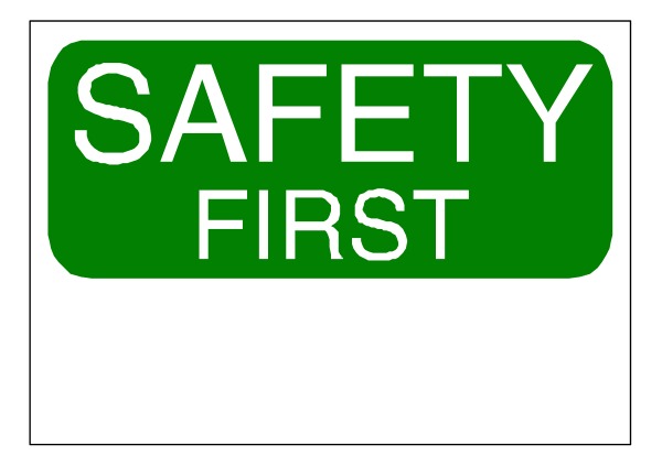 The image shows a green safety sign with white text that reads "SAFETY FIRST."