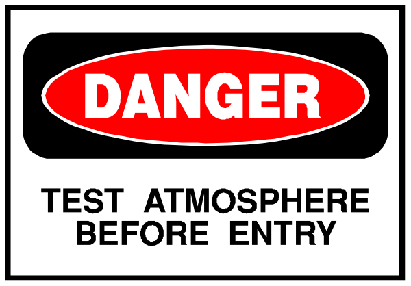 The image shows a sign with text that reads "DANGER BEFORE ENTRY" along with additional instructions to test atmosphere before entry.