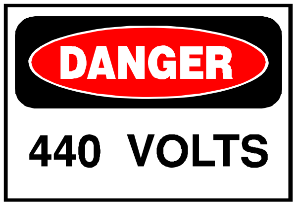 The image shows a sign with text that reads "DANGER 480 VOLTS" on top of another line of white text which is too small to read clearly in this description. Below these texts, there's an icon depicting two crossed-out lines forming the shape of a circle and inside it are three lightning bolts pointing upwards. The sign has a red border with black lettering that says "DANGER" at its top edge.