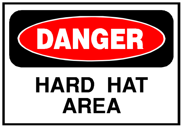 The image shows a sign with text that reads "DANGER HARD AREA" at the top and below it is another line of smaller print stating "HATS."
