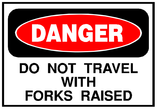 The image shows a sign with text that reads "DANGER DO NOT TRAVEL WITH FORKS RAISED."