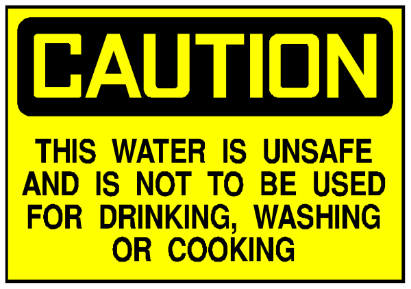 The image shows a caution sign with text that reads "CAUTION: This waters is unsafe for drinking; washing cooking or using it to be used."