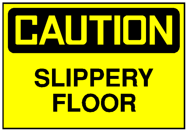 The image shows a yellow caution sign with black text that reads "CAUTION SLIPPERY FLOOR."