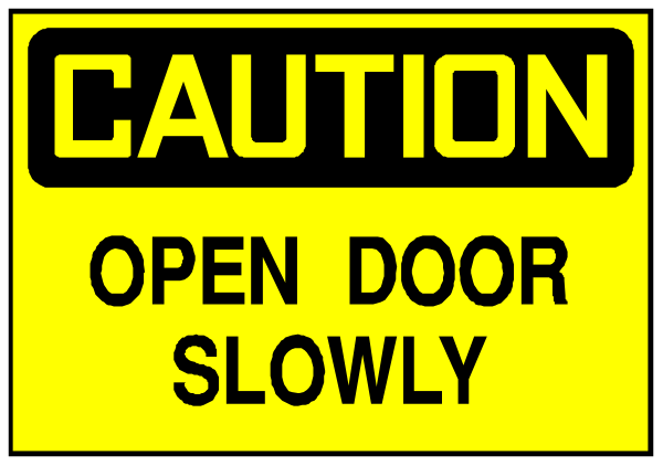 The image shows a caution sign with text that reads "CAUTION OPEN DOOR SLOWLY."