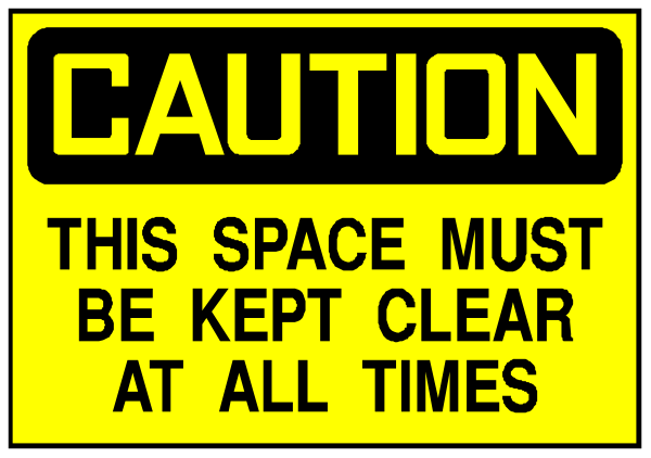 The image shows a yellow caution sign with black text that reads "CAUTION" at top and below it says "THIS SPACE MUST BE KEPT CLEAR AT ALL TIMES."