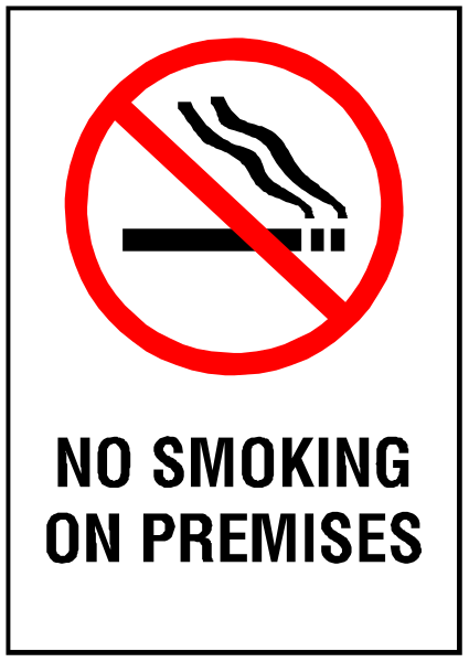 The sign prohibits smoking on premises with a cigarette symbol crossed out by an arrow pointing to it.