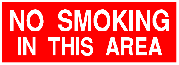 The image shows a red sign with white text that reads "NO SMOKING IN THIS AREA."