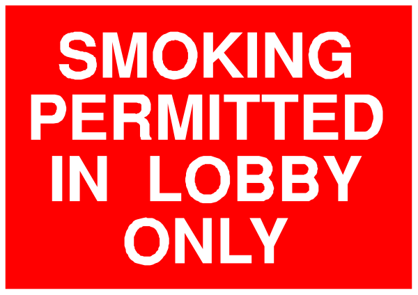 The image shows a red sign with white text that reads "Smoking permitted only" on it.