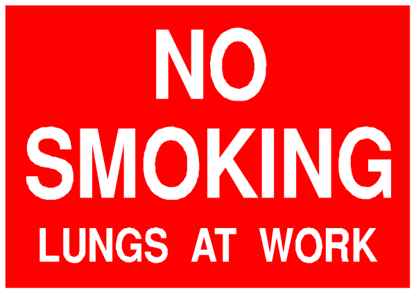The image shows a red sign with white text that reads "NO SMOKING" on top of another smaller sign below it stating "WORK LUNGS AT WORK."
